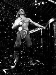 In middle school, I remember thinking how odd it looked when I would put a WCW championship on my Shawn Michaels Jakk's action figure; seeing it happen for real was one of those exceptionally odd 2002 wrestling moments.